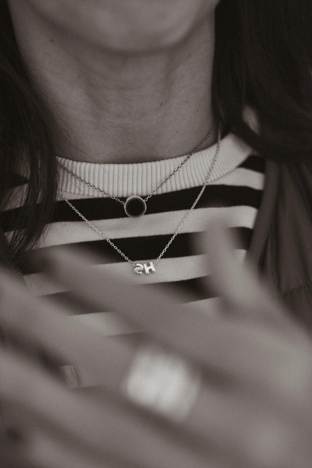 Necklace with two symbols